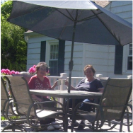 Some women on a back deck