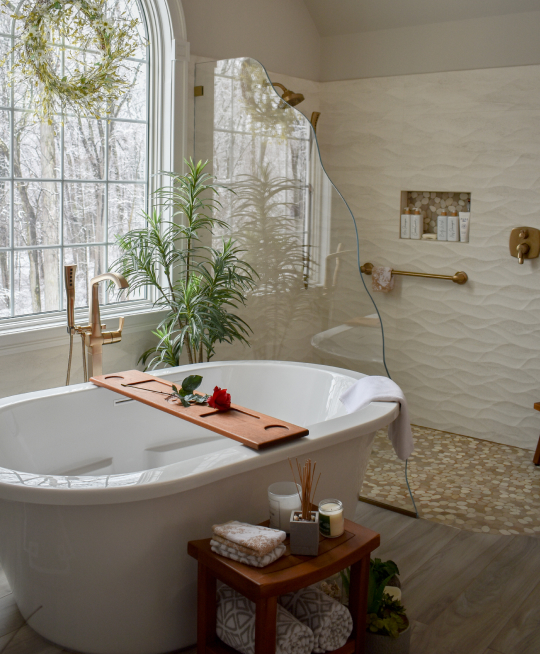 a remodeled bathroom with large tub