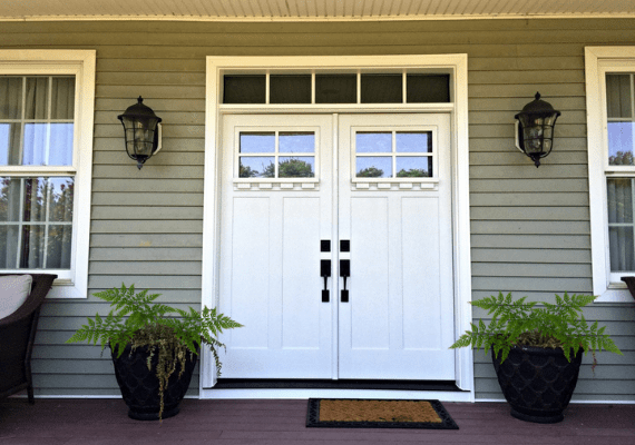 White Front Door with Two Black Flanking Sconces