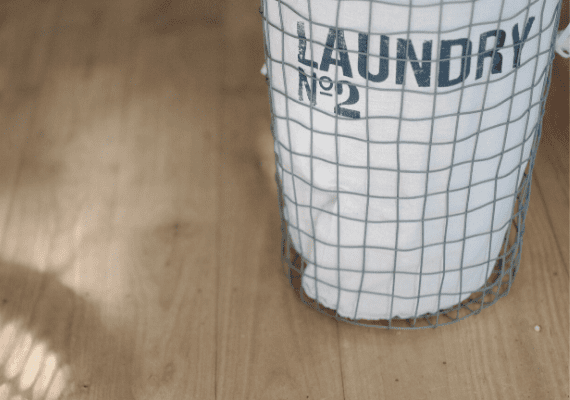 Laundry Basket on wood floors