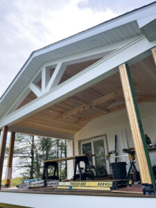 Covered porch addition on a home.